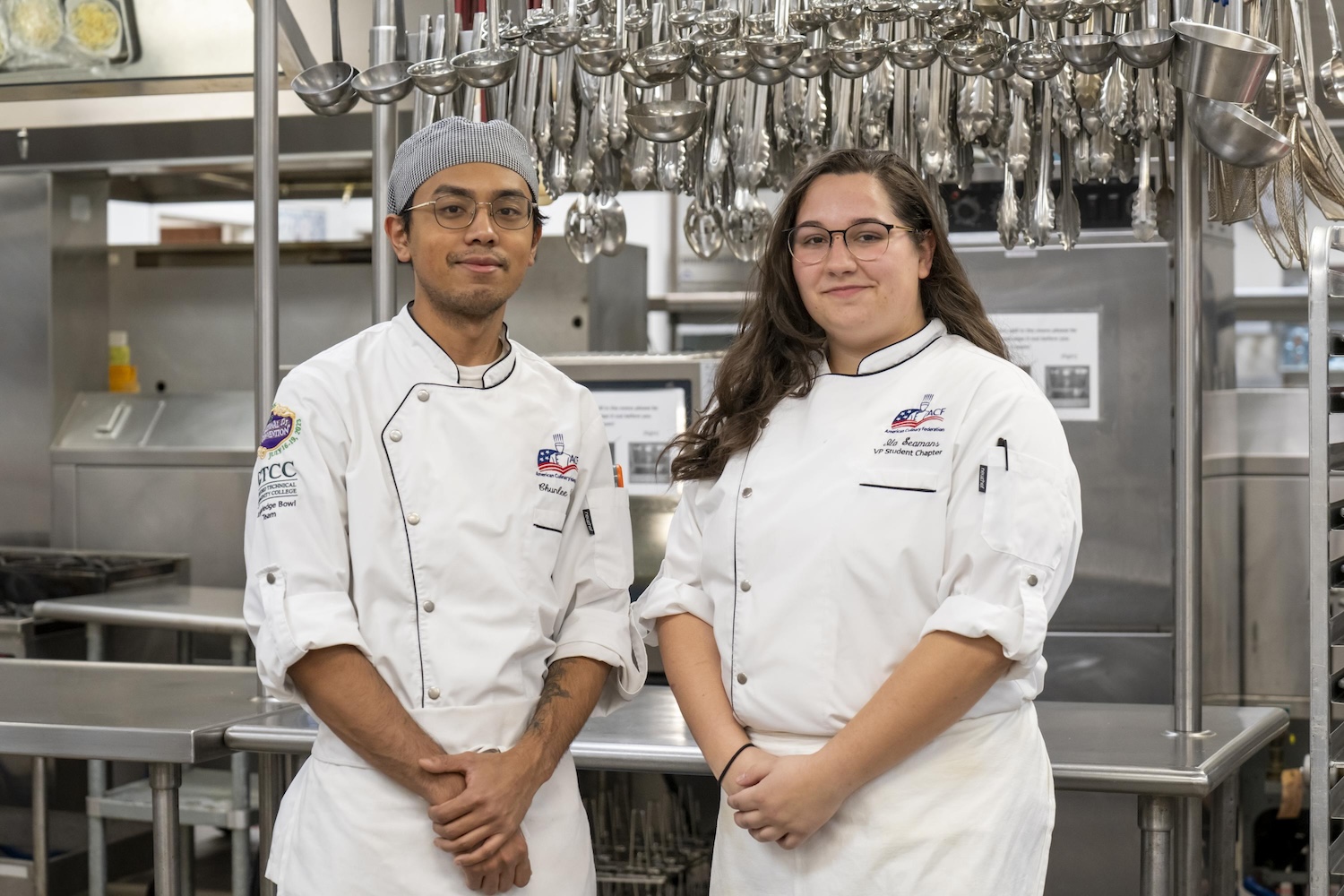 Chunlee Tith (left) and Ila Seamans pose for a photo in one of the GTCC kitchen.