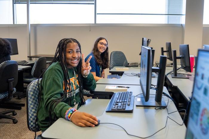 Creating with AI students working on computers