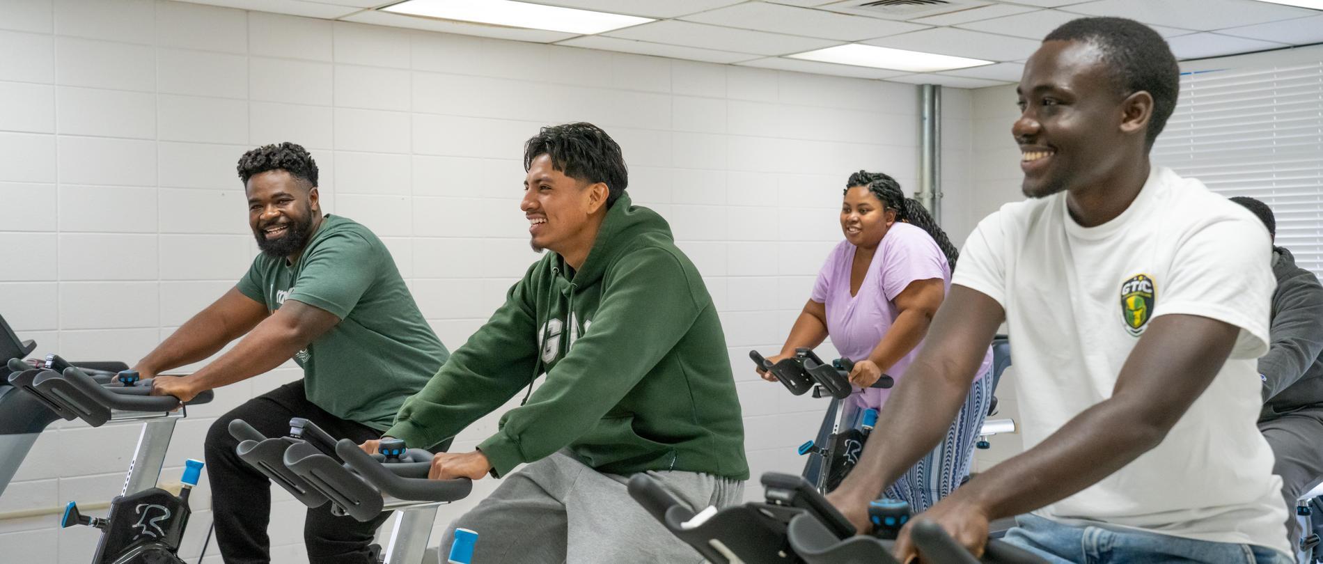 Fitness Club members cycling