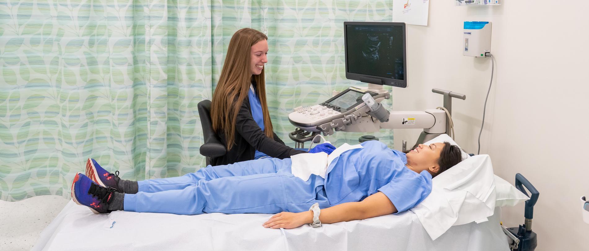 Two GTCC nursing students in a hospital room