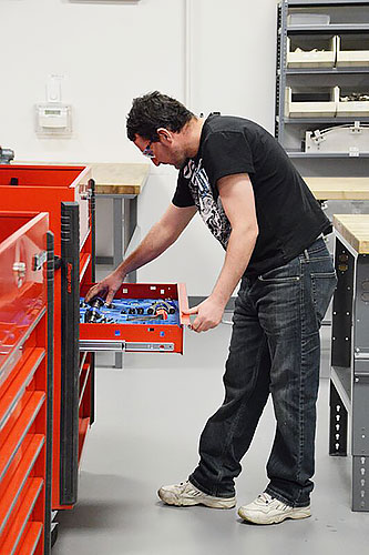 Student checking toolbox inventory