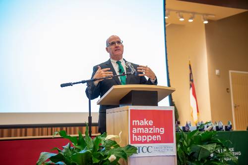 GTCC President Anthony Clarke speaks at a podium.