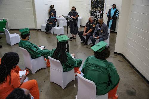 August graduation ceremony for three High Point Detention Center inmates completing their high school equivalency diploma. Photo courtesy of Guilford County Sheriff's office, Mike Leonard. 