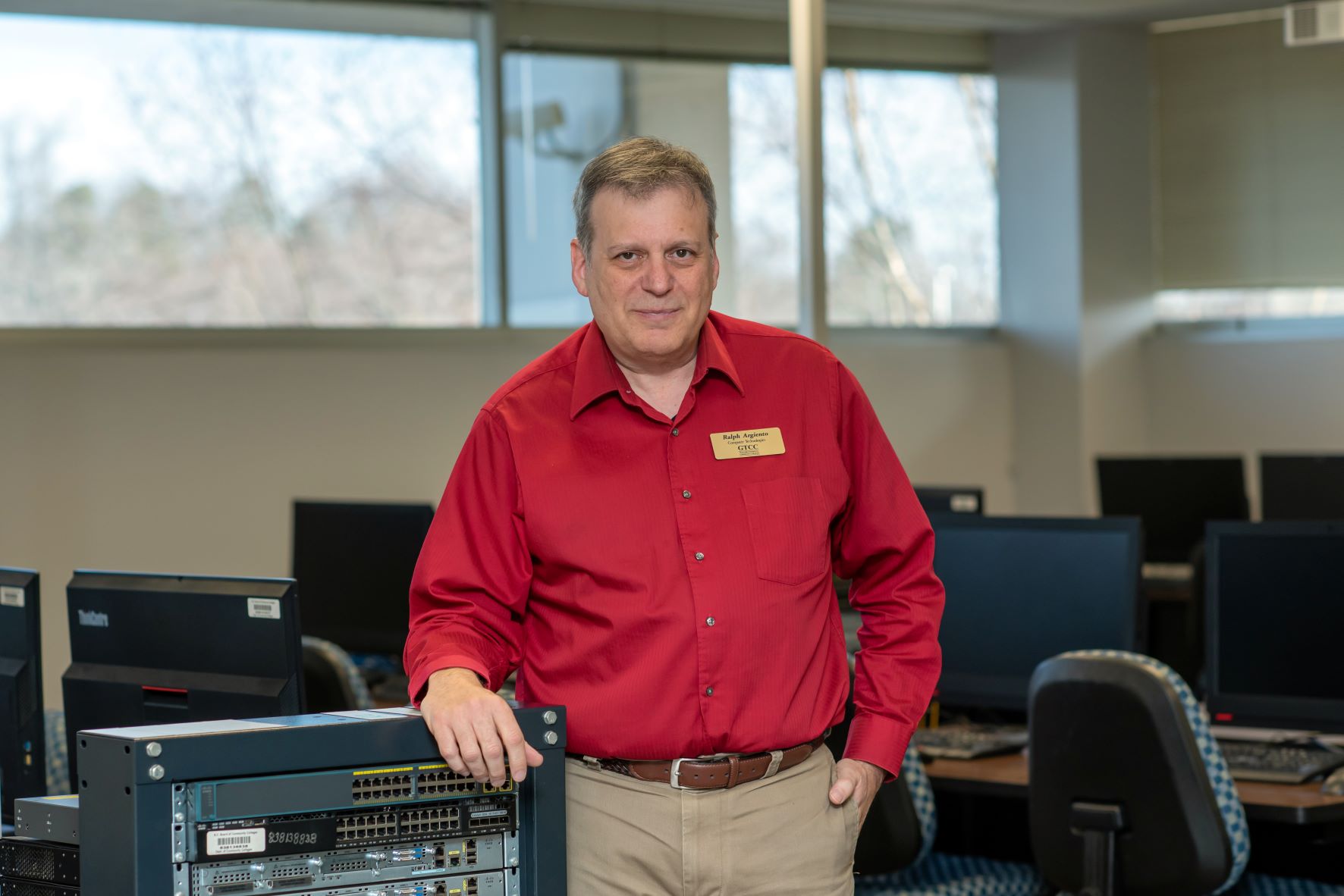 Ralph Argiento poses for a photo in one of GTCC's computer labs.