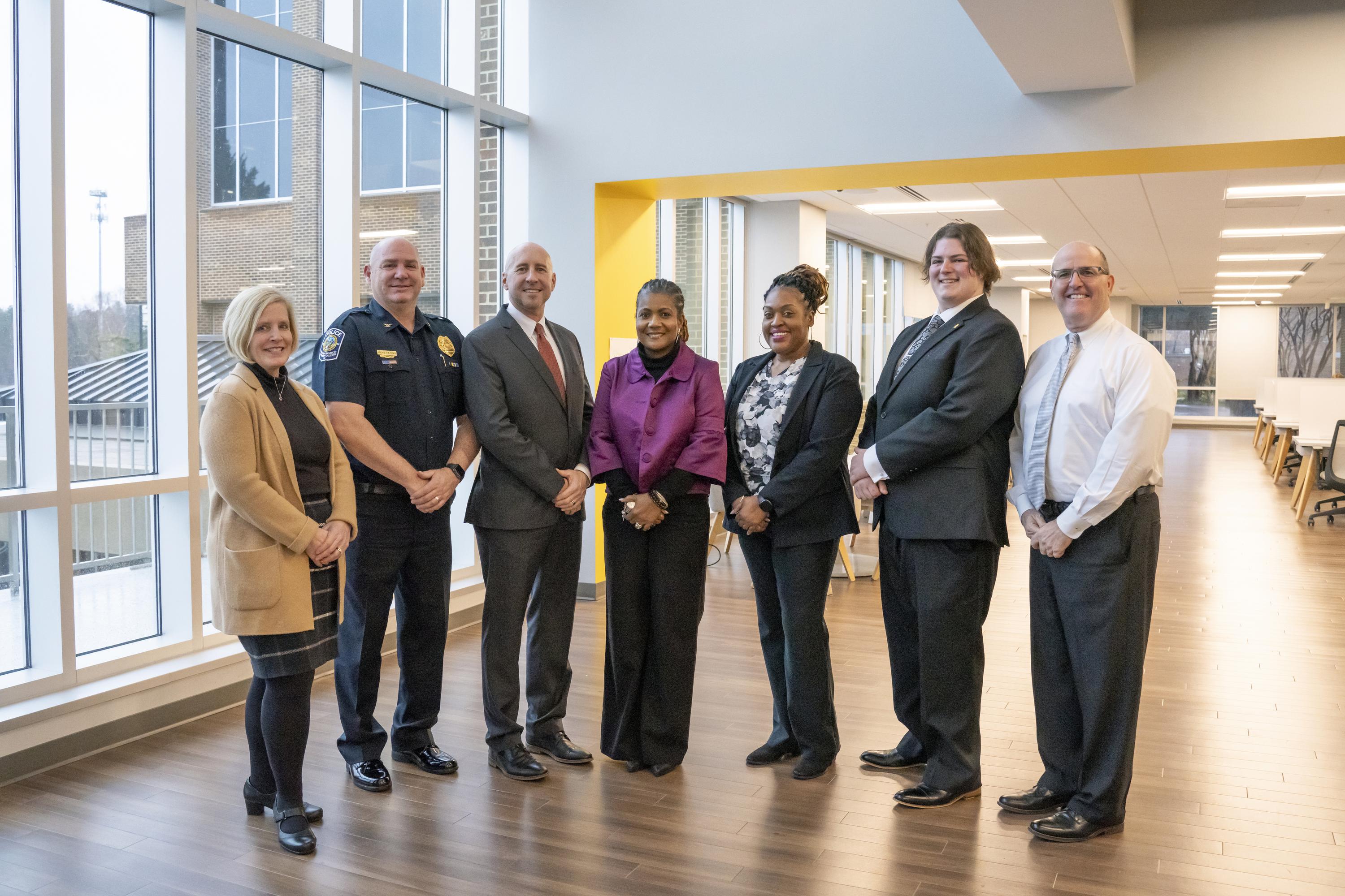 The winners of the MLK service award pose for a picture with GTCC President Anthony Clarke, Ph.D. and Ann Proudfit, Ph.D.