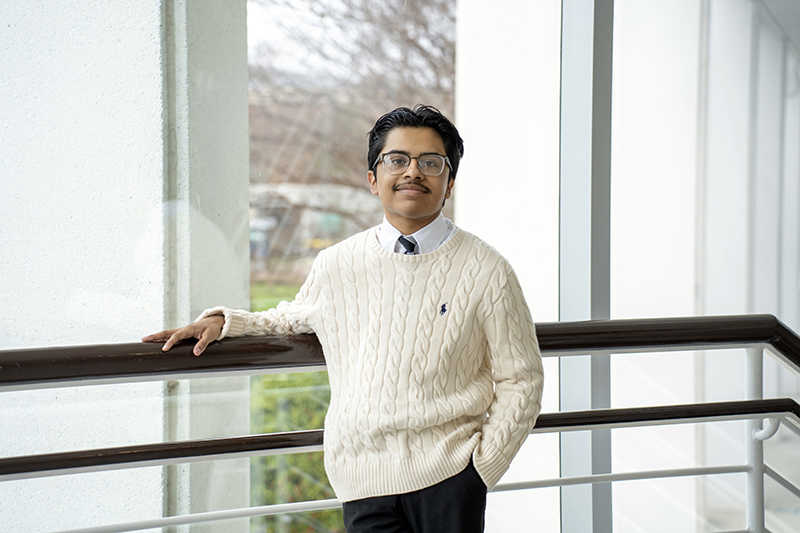 Portrait of Jorge Suarez in Medlin Campus Center.