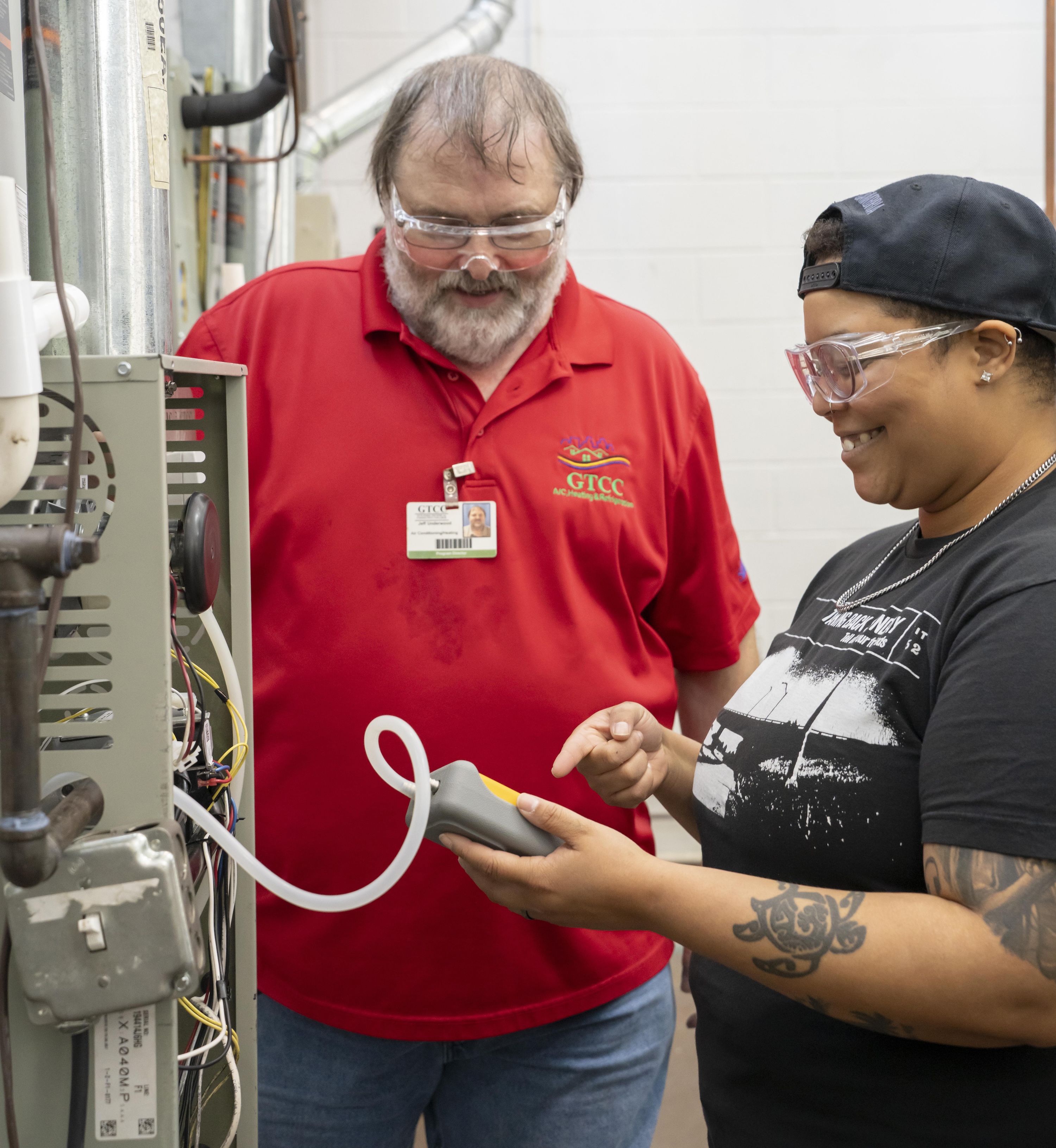 AC/Heating & Refrigeration Program Director Jeff Underwood (left) and Kleadus Foreman