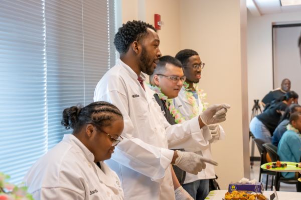 William (second to the left) and a few of his classmates at their recent POWER Pathways Program graduation.