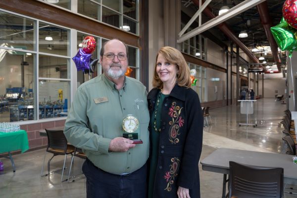 Jeff Faircloth and Beth Pitonzo at Faircloth's retirement party.