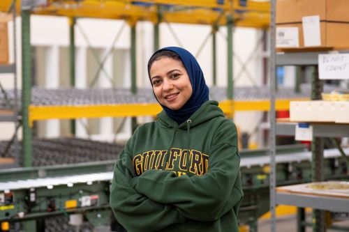 GTCC student Noha Hamed in a warehouse