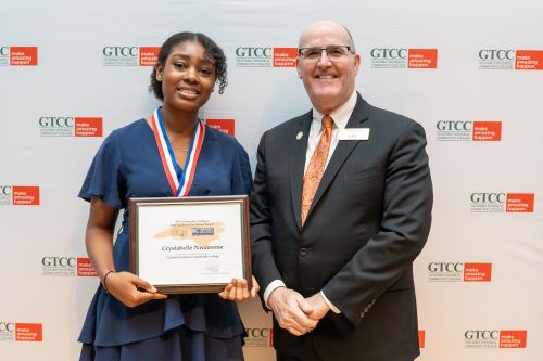 North Carolina Community College System Academic Excellence Award winner and GTCC student, Crystabelle Nwameme with GTCC President Anthony Clarke, Ph.D.