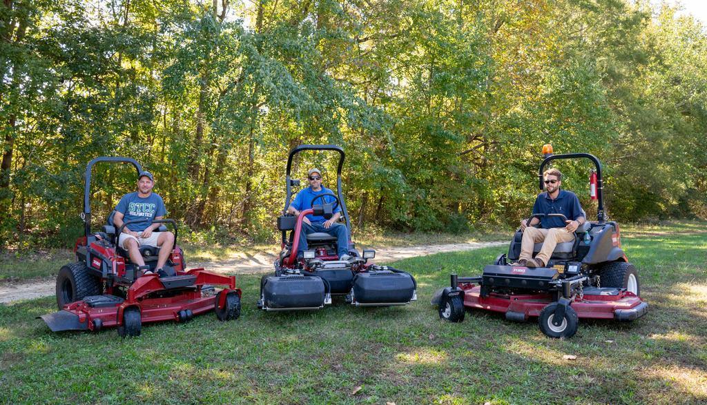 Turfgrass Management Technology students on riding lawnmowers