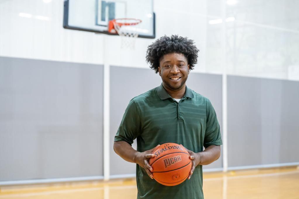 “I get to guide these young men who were in the same spot as I was to accomplish their goals,” said Cook. “I love being able to help, motivate, and give advice to these student-athletes.”